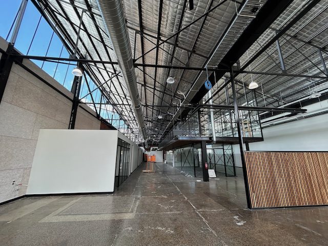 Old wool mill transformed into modern industrial office complex with mezzanine and t-bar windows completed by Harris Steel geelong